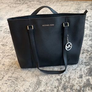 Michael Kors black bag with silver accents